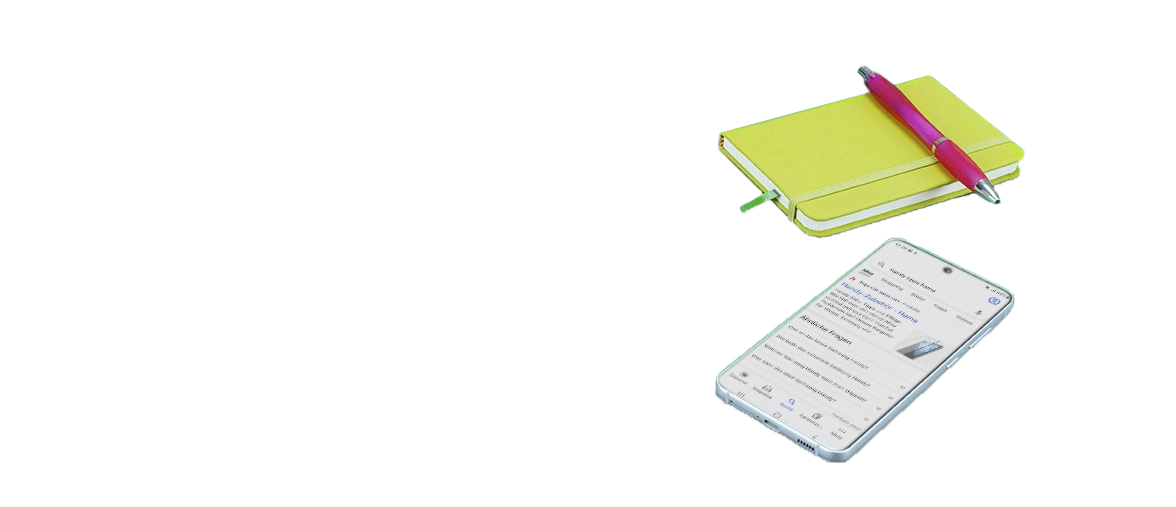 Bloco de notas e telemóvel ao lado um do outro.