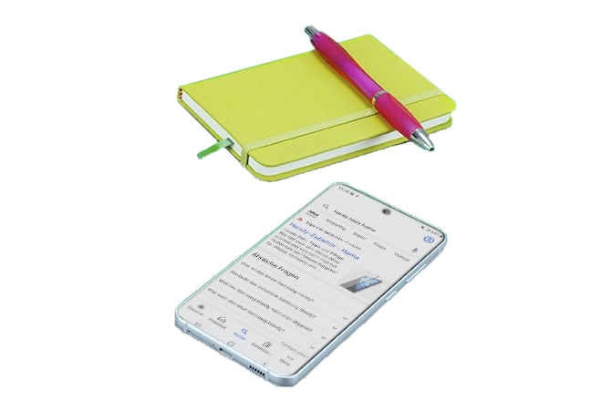 Bloco de notas e telemóvel ao lado um do outro.